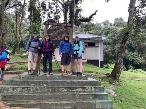 Our group at the Machame Gate sign.